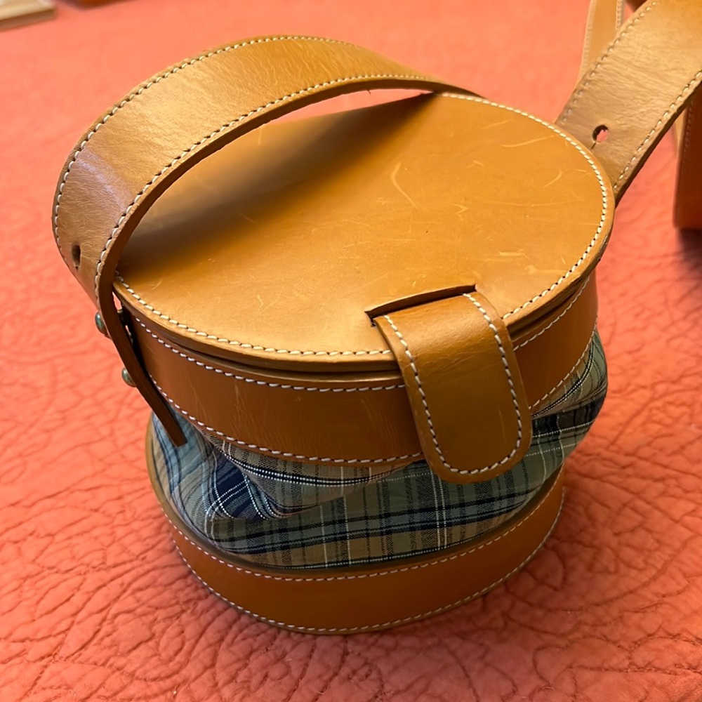 donna karan, 90s vintage. madras. magnetic snap. inside is pristine. never used.